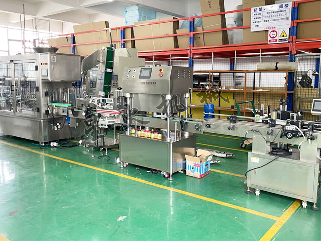 自動蒜蓉醬灌裝旋蓋生產線(圖1)